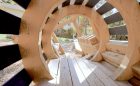 train themed wood sculpture tunnel