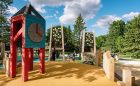 Tower sculpture wood playground accessible clock