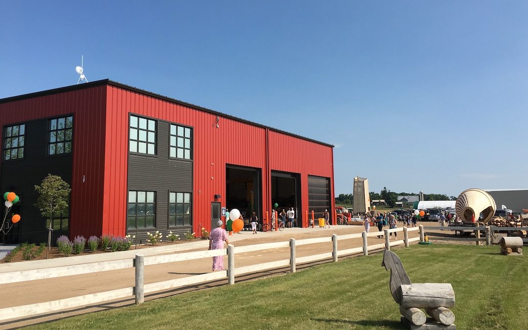 red and charcoal barn-style office building new design studio