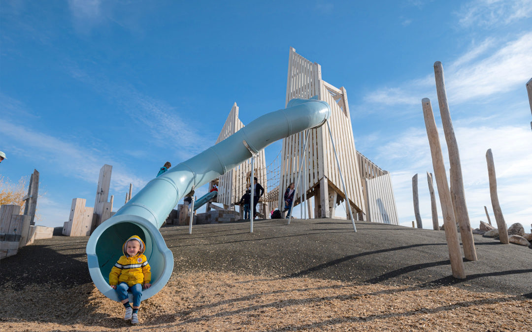 Saskatood Saskatchewan natural playground wood towers tube slide