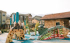 Breckenridge Colorado river themed playground trout climbing wall sculpture