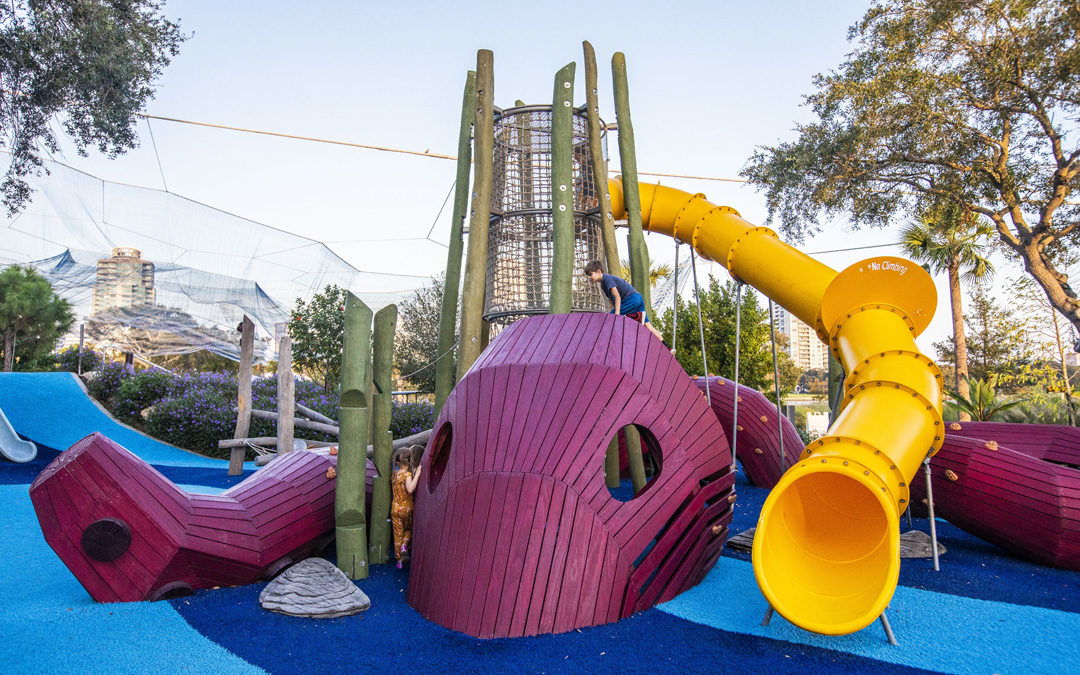 Kraken octopus sculpture destination playground Florid robinia log tower nets