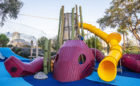 Kraken octopus sculpture destination playground Florid robinia log tower nets