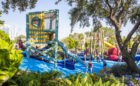 marine themed playground Florida lifeguard tower slides logs natural wood