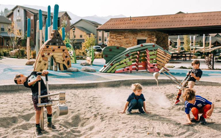River Park Breckenridge sand play accessible natural playground fish sculpture