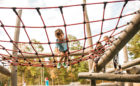 North Carolina natural playground log climber net social play high challenge