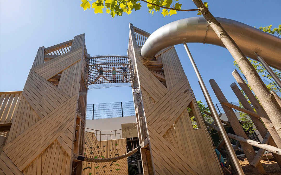 Georgetown Day School playground equipment includes two towers and slide with bridge.