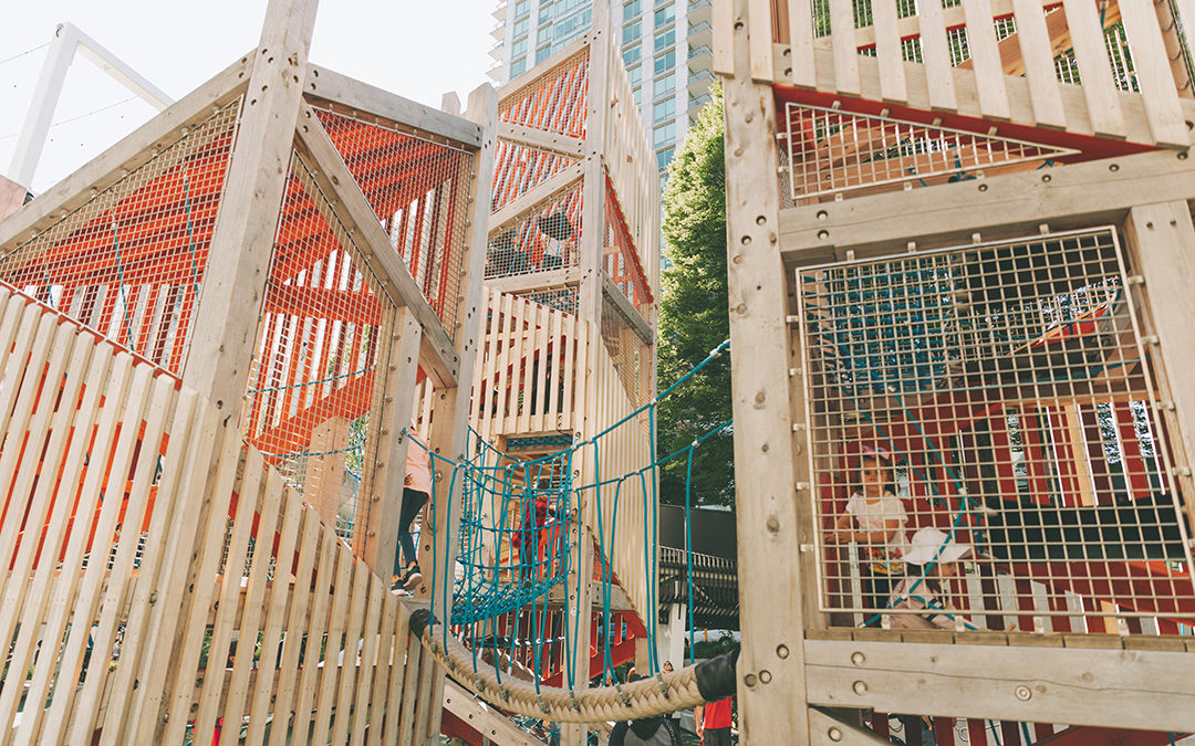 Accoya cladding and wire mesh on playground towers with giant rope bridge