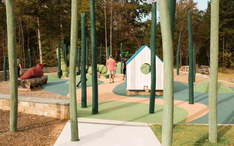E Carroll Joyner park natural wood playground robinia posts birdhouse hut worm cardinal sculpture