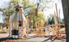 Johnston McVay park natural playground hawk sculpture tower robinia log climber