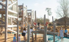 pine cove houston texas natural wood playground log climber nets timber towers