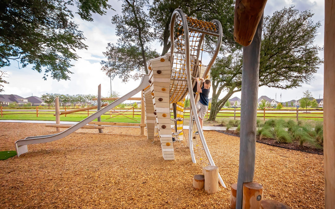 natural wood playground tomball texas grazing horse custom sculpture high challenge climber ropes