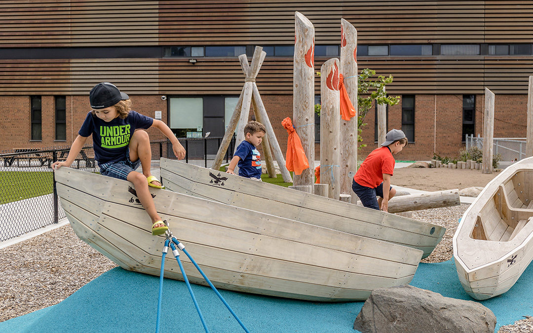First Nations inspired canoe sculptures in child care playground
