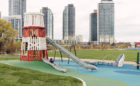 Fairwinds park wood playground lighthouse tower with slide and whale sculpture