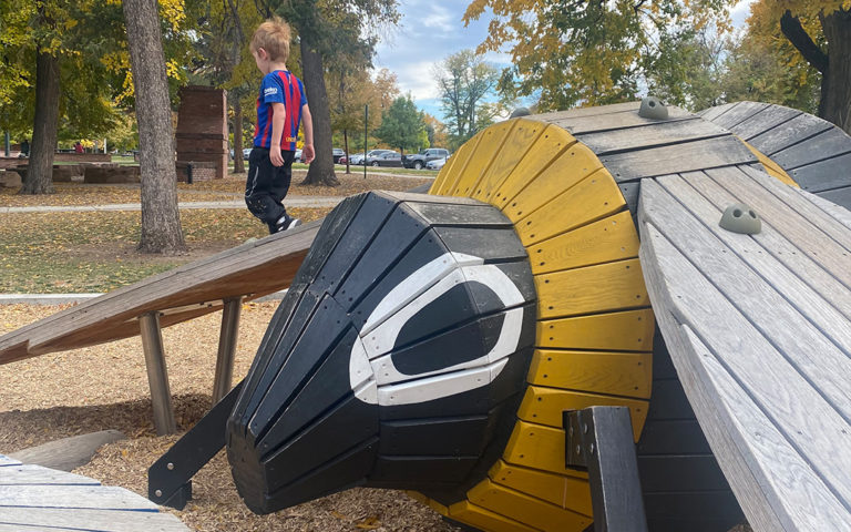 Patina of play seen on bee sculpture at Washington Park Denver