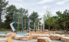 Natural wood playground Colorado log tower boulders