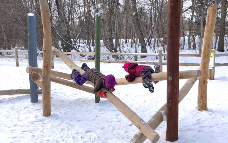 Winter play at Sir Wilfrid Laurier Park playground in Edmonton
