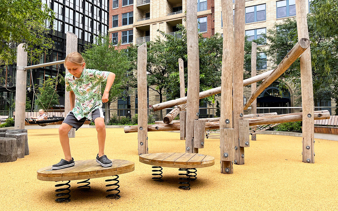 Amazon HQ2 playground in Arlington with wobble boards bog stilts and a log jam.