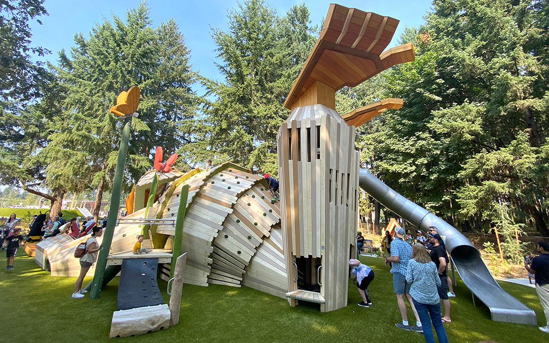 Oro the Giant is lying down and an accessible playground in Oregon