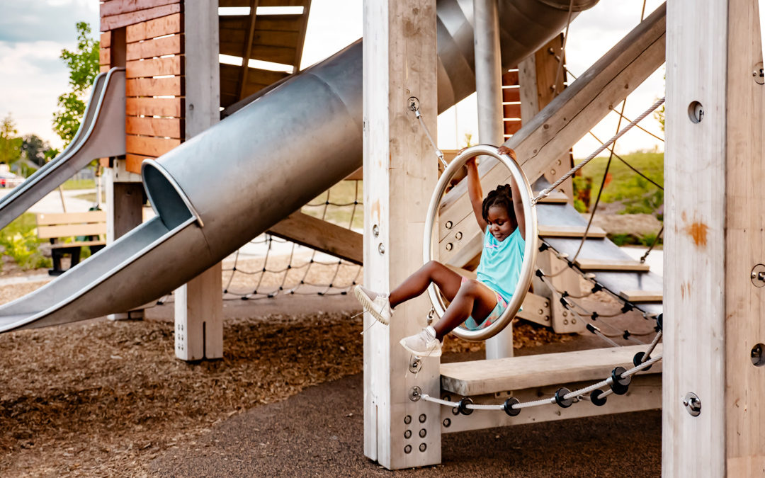 Glass City playground stainless slide hoops and ropes in timber tower