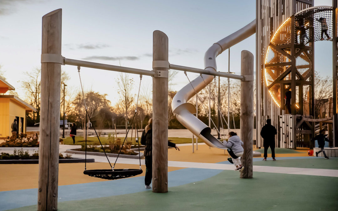 Swing set by Earthscape Collections at Joe Louis Greenway playground in Michigan